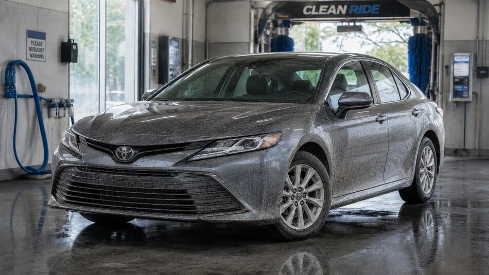 Car before pressure washing — dusty and dirty